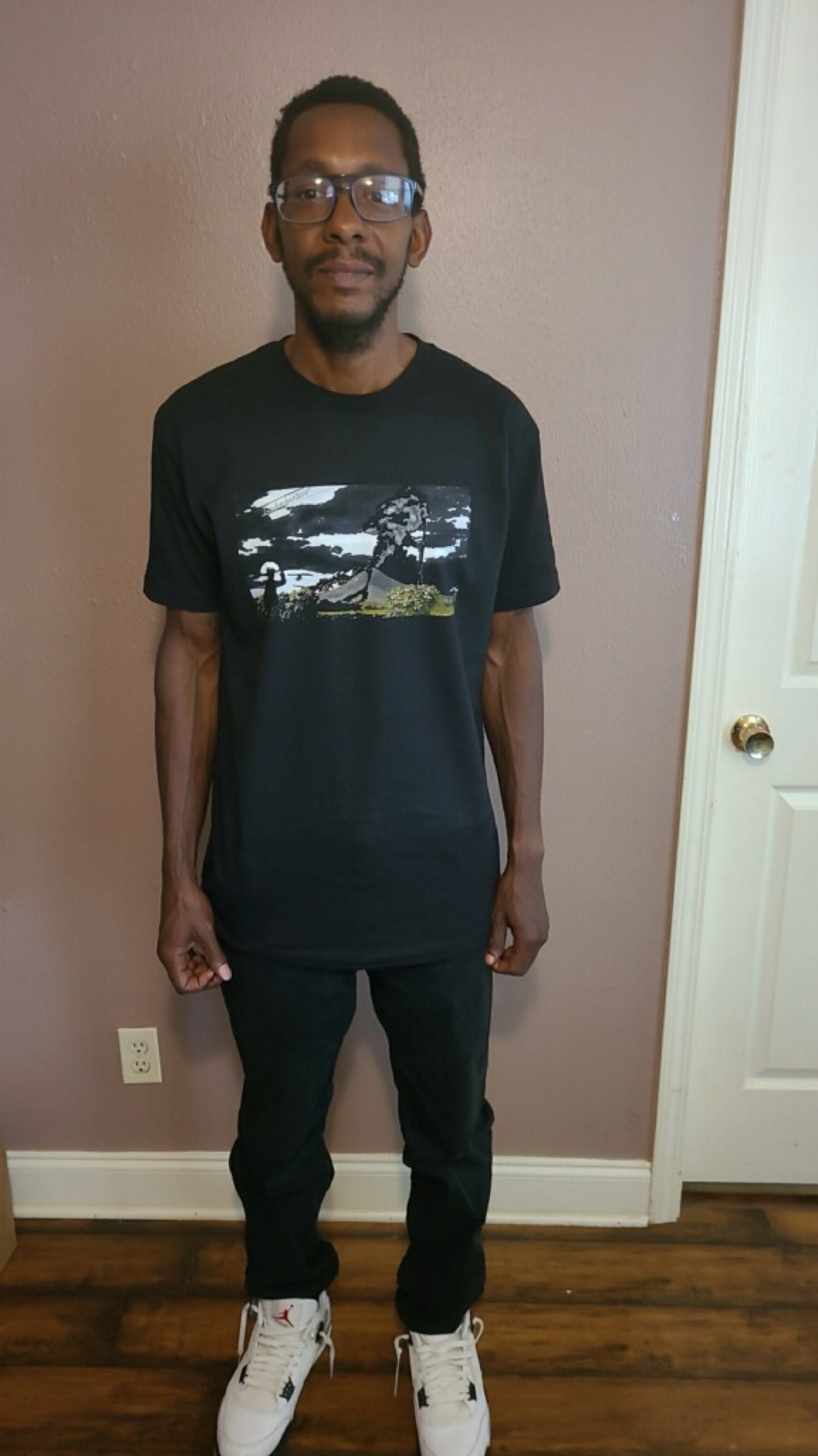 Lowkey Logo T full body on model with sneakers