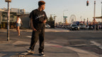 LOWKEYES T ALBINO worn by model at street crossing